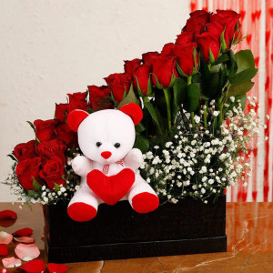 Teddy with red rose in a beautiful black box